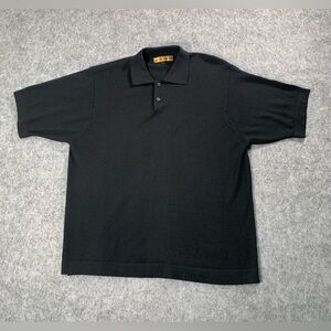 Classic black knit top with gold satin label